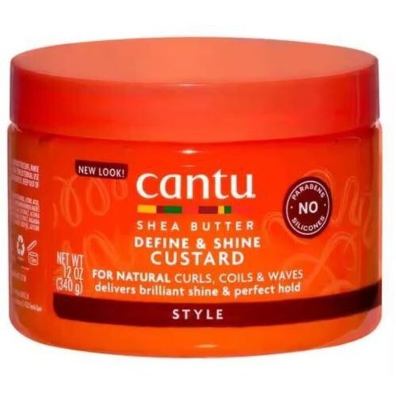 Cantu Taukmedžio sviesto „Define & Shine Custard“ formavimo kremas banguotiems ir garbanotiems plaukams suteikti blizgesio.